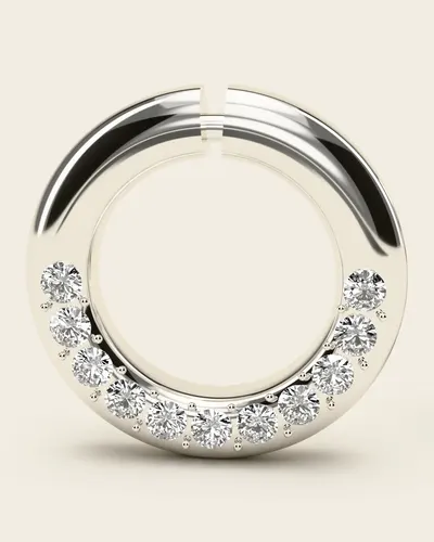Pachni White Gold Huggies, 14k white gold. Close-up of one hoop: the curve of tiny stones set into the thick front of the ring.