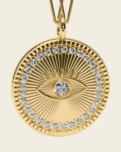 Mati Evil-Eye Necklace, gold-plated 925 silver. Close-up of the medallion: the engraved eye with a stone for the iris, the radiating lines and the ring of tiny stones.