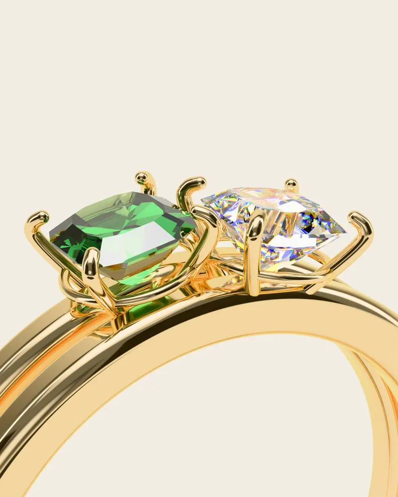 Mazi Two-Stone Ring, gold-plated 925 silver. Close-up of the two square stones side by side, each in four claws, on the split band.